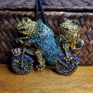 Mom&little frog out for a bike ride brooch.